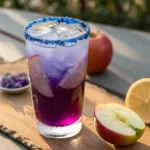 dried and fresh butterfly pea flowers beside brewed tea
