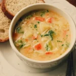 Delicious creamy vegetable soup with fresh vegetables in a bowl