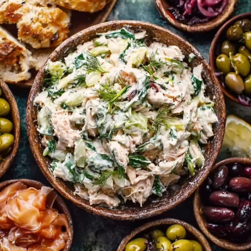 Colorful I N S A L A T A recipe featuring fresh Mediterranean ingredients.