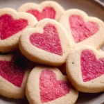 Freshly baked Slice and Bake Valentine's Day cookies decorated with love.