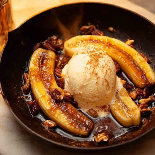 A delicious banana foster recipe with caramelized bananas and ice cream.