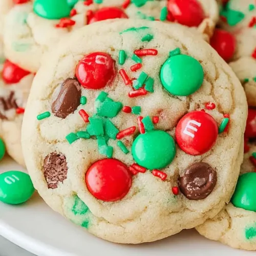 Various decorated Christmas cookie recipes displayed festive arrangement