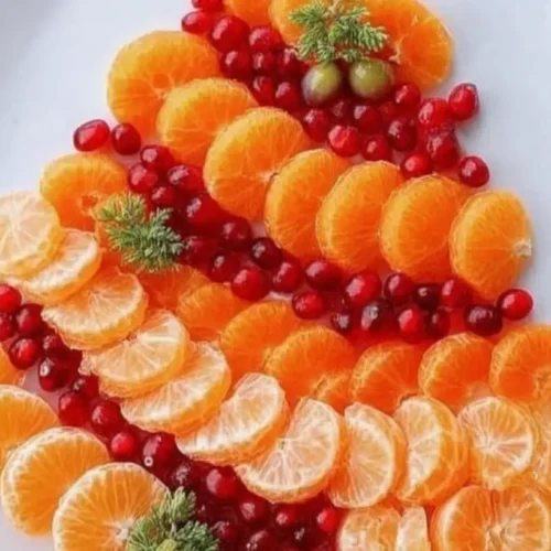 A lavish spread of Xmas food, featuring roast turkey and holiday garnishes.