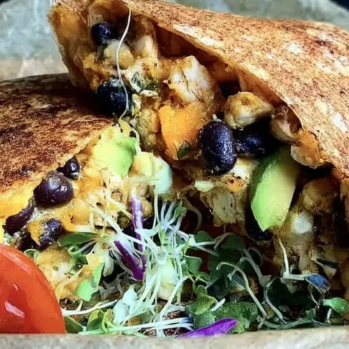 A collection of diverse food cravings recipes laid out on a kitchen counter.