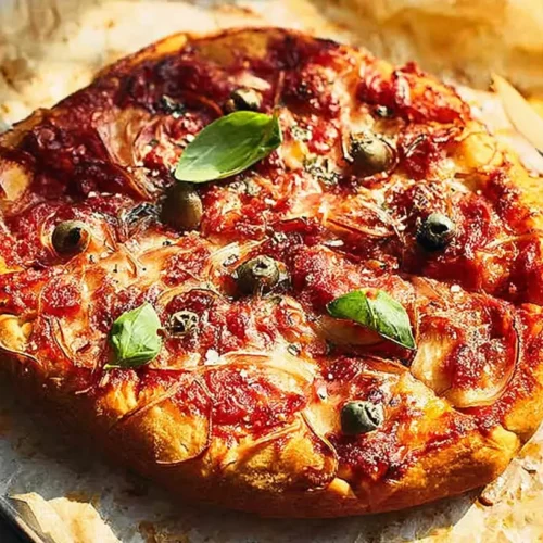 A bubbling slow cooker pizza with melted cheese and pepperoni