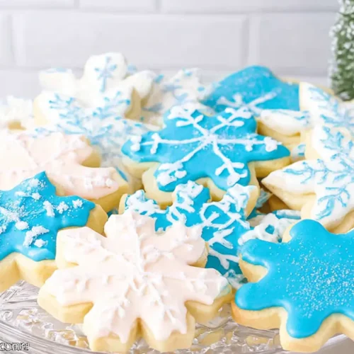 A stack of perfectly baked sugar cookies ready for decorating, showcasing the best sugar cookie recipe.