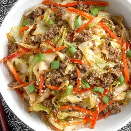 A vibrant Chinese ground beef and cabbage stir-fry, rich with colorful vegetables