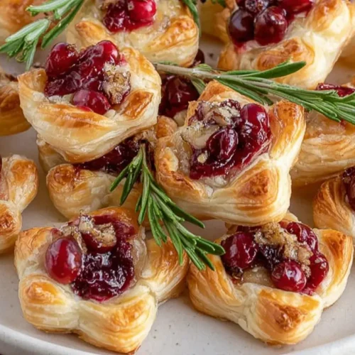 Close-up of cranberry brie bites, golden and appealing.