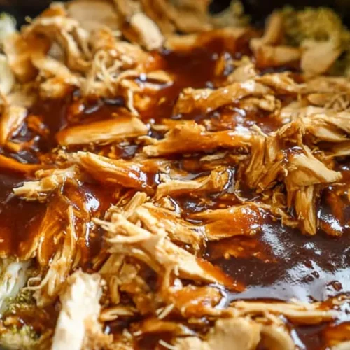 A slow cooker filled with Dump and Go Crockpot Teriyaki Chicken.