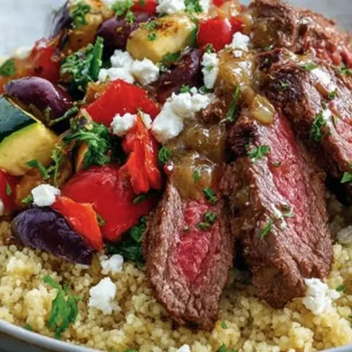 A vibrant Mediterranean steak bowl recipe with fresh vegetables