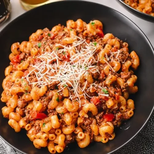 A hearty one pot beefaroni dish simmering on the stove