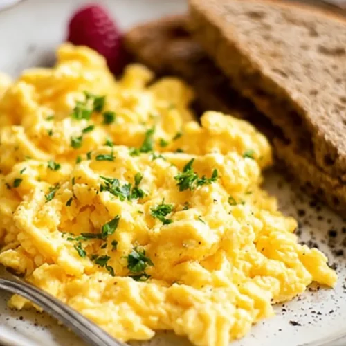 A plate showcasing perfectly cooked breakfast eggs.