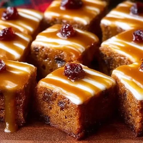 A delectable slice of sticky toffee pudding cake, rich and dark.