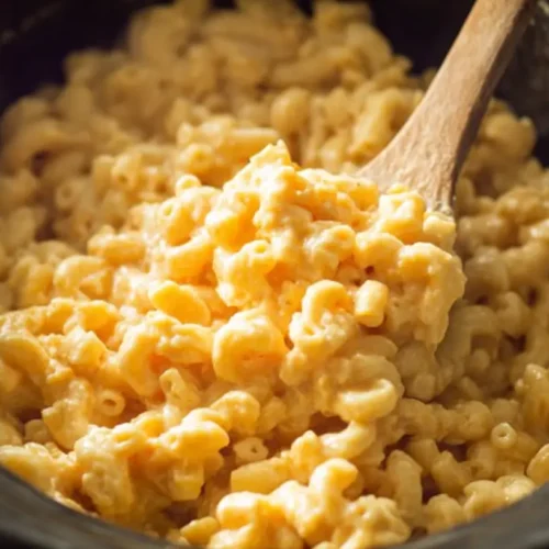 A serving of delicious crockpot mac and cheese, ready to eat.