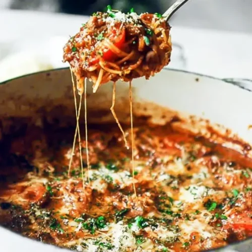 An easy healthy dinner recipe cooked one-pan style, showcasing colorful vegetables and lean protein.