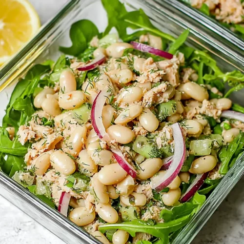 A bowl of tuna white bean salad, ready to eat