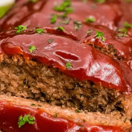 An easy family meatloaf dinner, ready to be served on a kitchen counter.