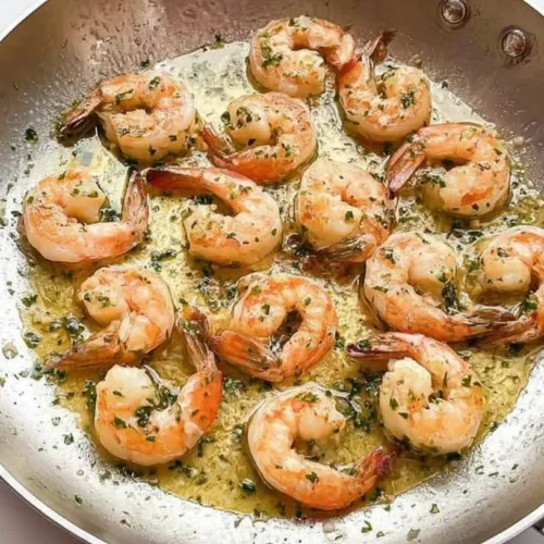 A serving of easy garlic butter shrimp in a skillet, ready to eat
