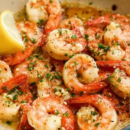 A sizzling garlic butter shrimp skillet, perfectly golden.