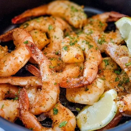 A platter of quick lemon shrimp, perfectly cooked and seasoned.