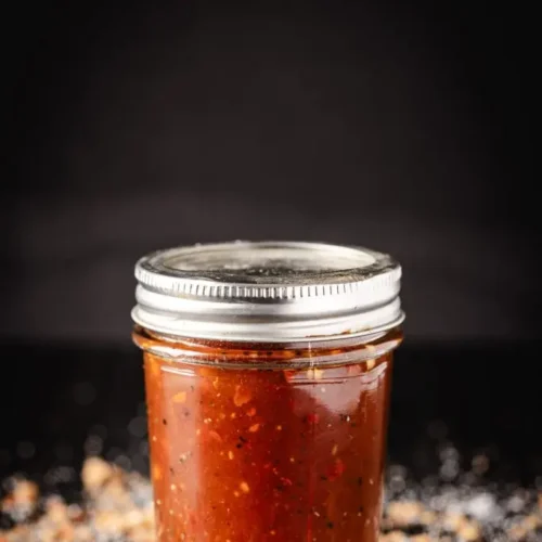 A bowl of Carolina pulled pork vinegar sauce, ready for serving