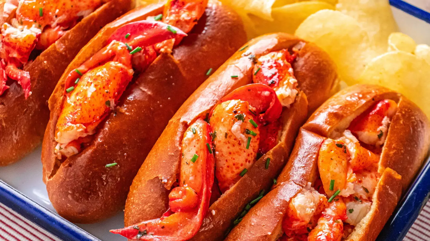A Connecticut hot buttered lobster roll served on a toasted bun with melted butter