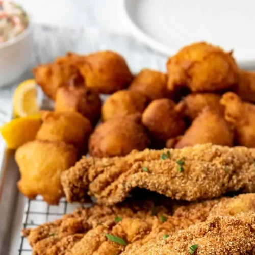 Platter of crispy, golden fried catfish fillets.