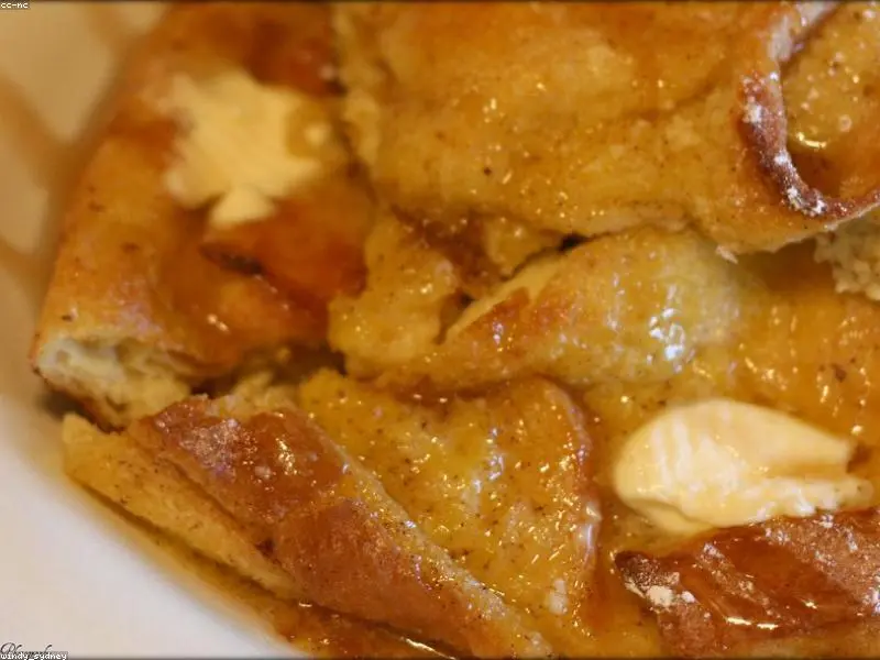 A freshly baked family-style breakfast casserole bake with eggs, cheese, and sausage.