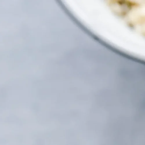 A vibrant spread of healthy breakfast recipes rich in protein, featuring eggs and avocado.
