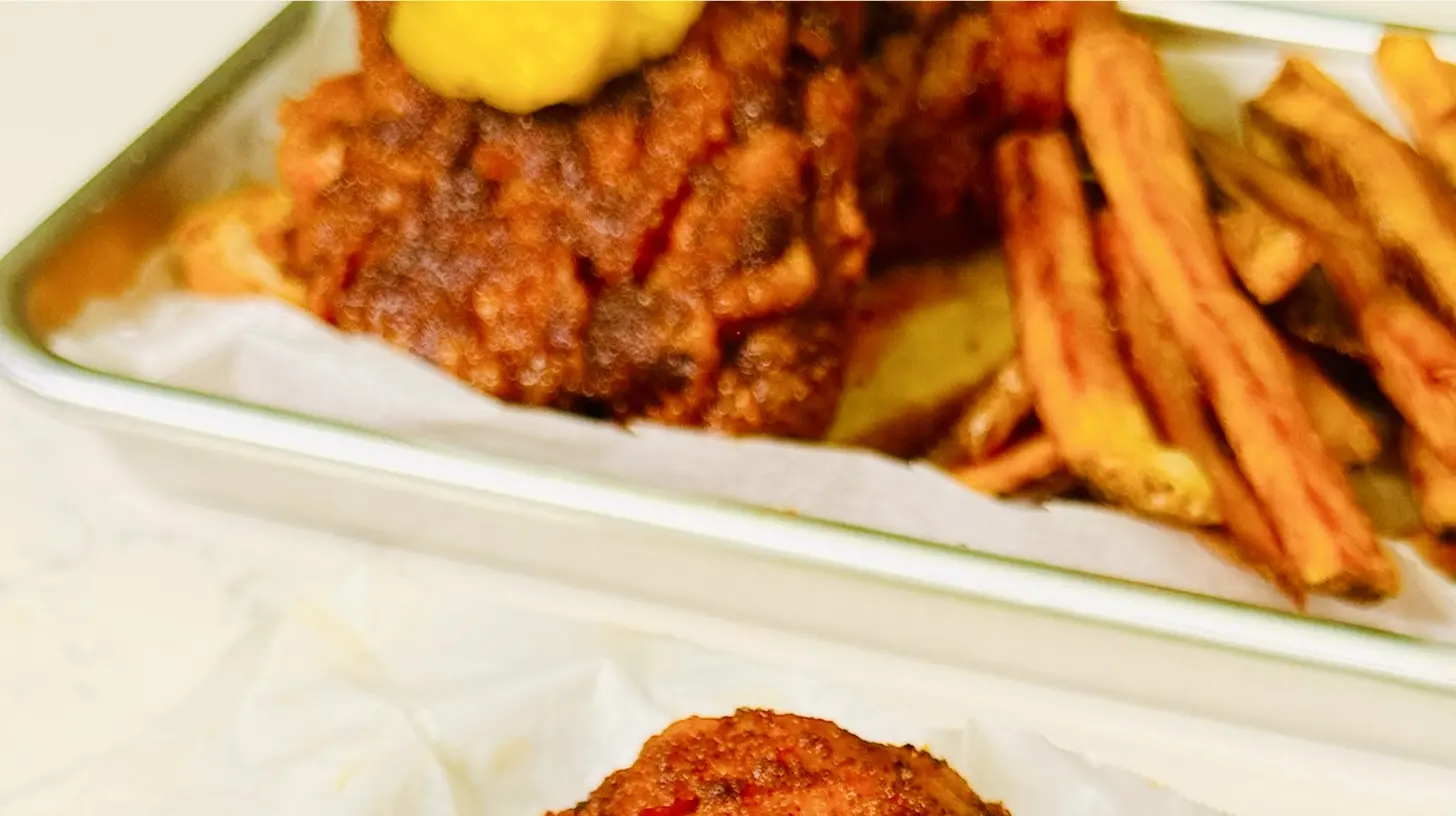 Crispy fried Nashville hot chicken with a fiery red glaze