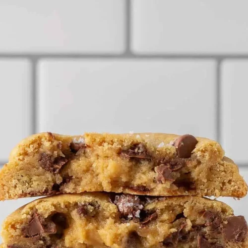 A freshly baked New York chocolate chip cookie with melty chocolate puddles