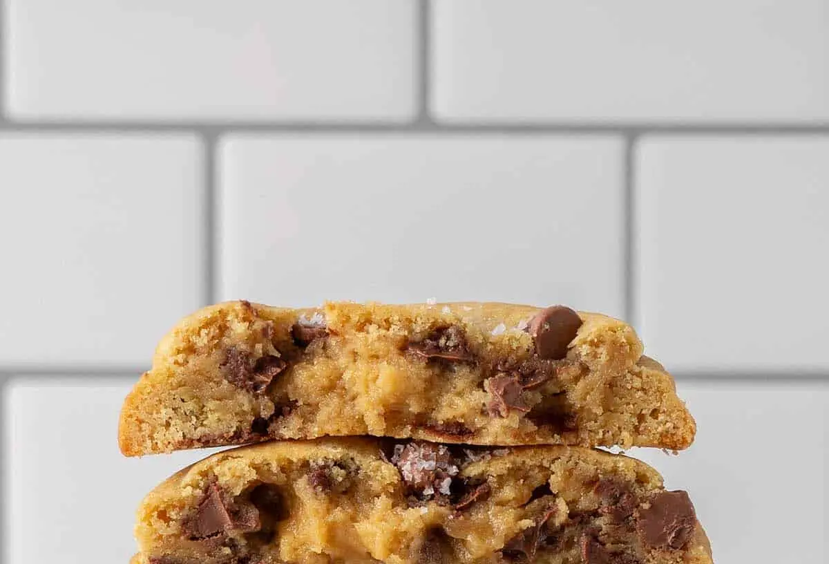 A freshly baked New York chocolate chip cookie with melty chocolate puddles