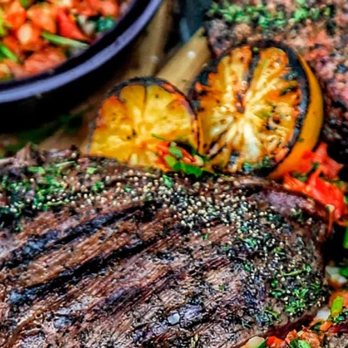 A juicy Santa Maria tri-tip steak, expertly grilled and ready to be served.