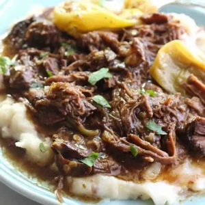A tender Mississippi pot roast, slow-cooked to perfection, served with gravy.