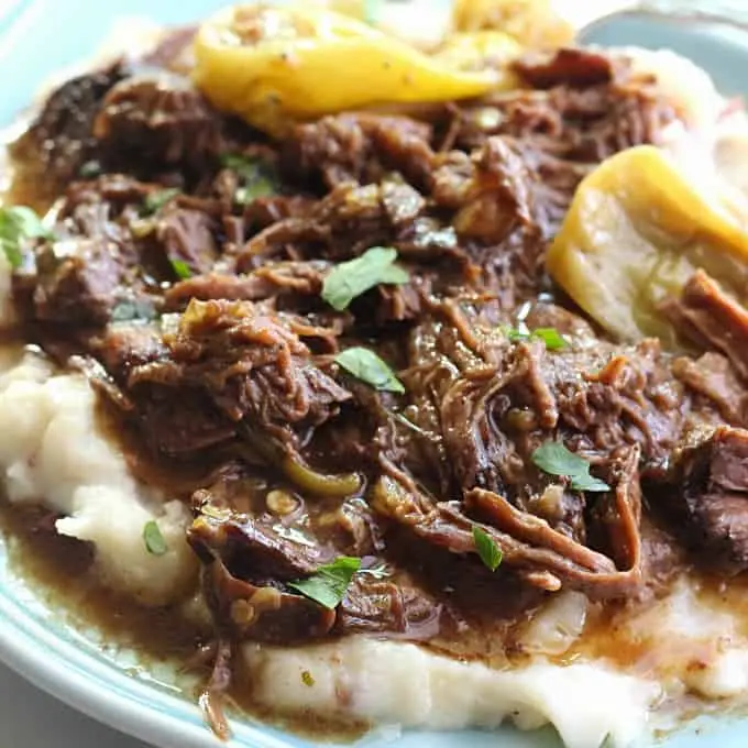 A tender Mississippi pot roast, slow-cooked to perfection, served with gravy.