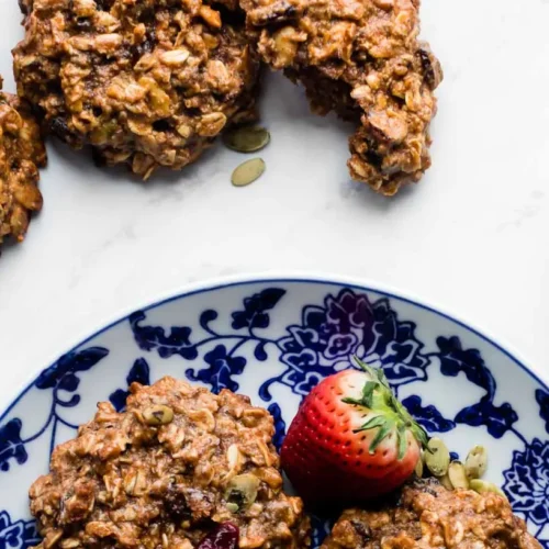 A variety of wholesome breakfast ideas laid out on a table, including fruit, oats, and eggs.